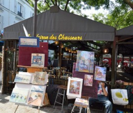 Place du Tertre – malarz Malarz przy sztalugach na Place du Tertre